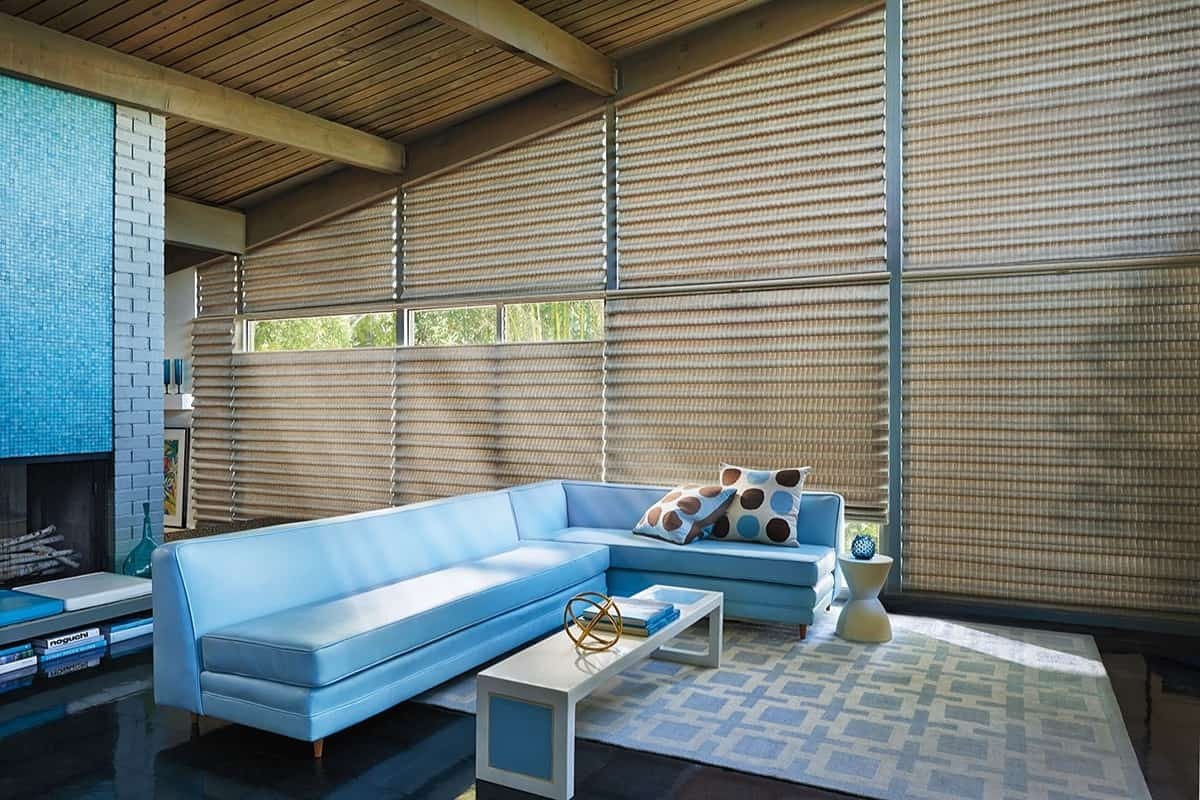 A modern living room featuring Hunter Douglas Vignette® Roman Shades near Santa Fe, New Mexico (NM)